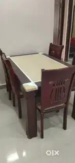 Fancy Marbel top with  design dinning table with six chairs for sell.