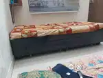 Diwan with storage boxes and bed