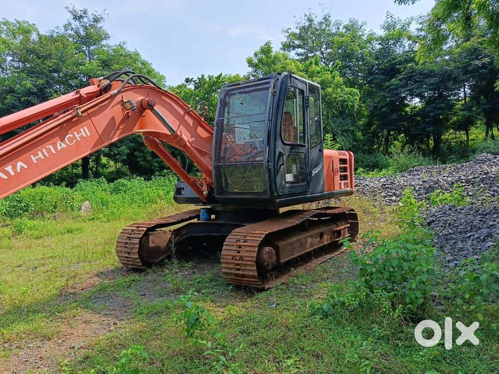 Tata Hitachi 110EX, with breaker