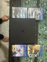 Playstation 4 slim 1 tb with 4 games