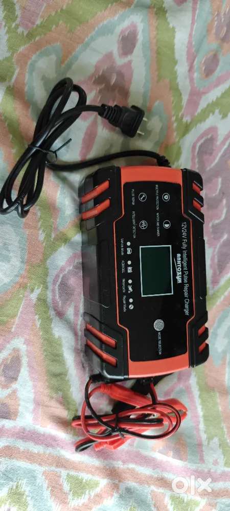 Brand New Car Battery Charger 12/24 Volts for sale.