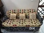 Elegant 3+2 Sofa Set with Floral Design and Wooden Armrests