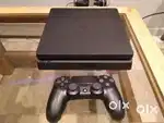 PS4 Slim 500GB with 2 Controllers & 5 Games – Excellent Condition