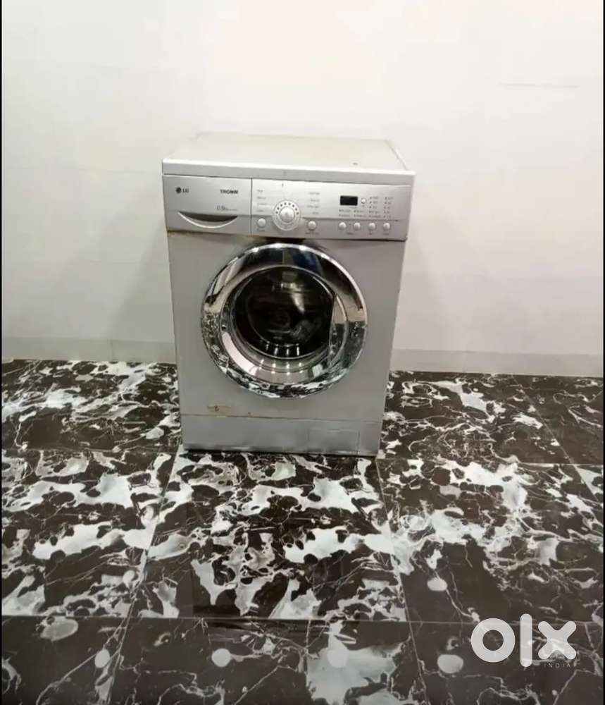 Trom front load silver colour washing machine with best offer