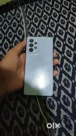 Back have 3 cracks battery changed and no scrathes on display with box