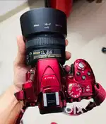 Nikon D5300 Red with two lenses 18-140mm & 50 mm