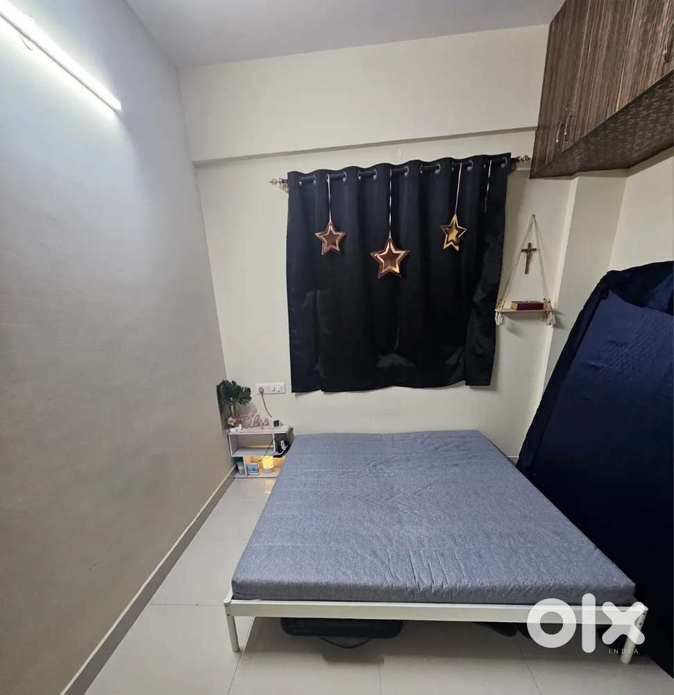 Ikea queen size bed and side table.