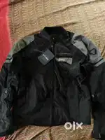 Riding jacket and Saddle bag Unused (New)