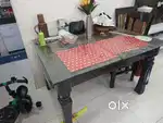 Dining table with 4 chairs and glass cover