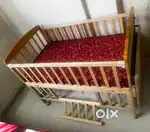 Baby cot with mattress and swing option
