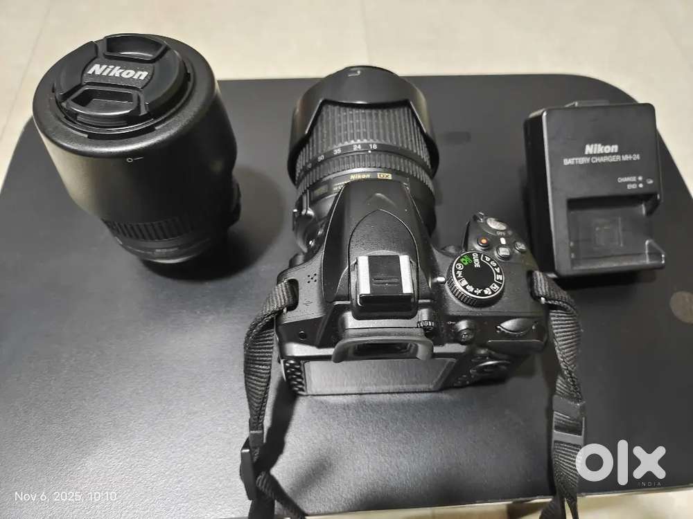 Nikon D3200 with 2 lens and memory card.