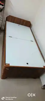 3 by 6 feet wooden bed