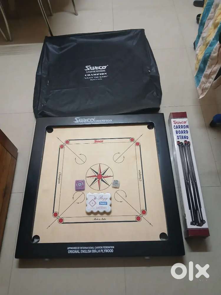 Surco champion 20mm Carrom board two strikers, stand goti