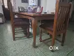 Elegant teak wood dining table with eight chairs