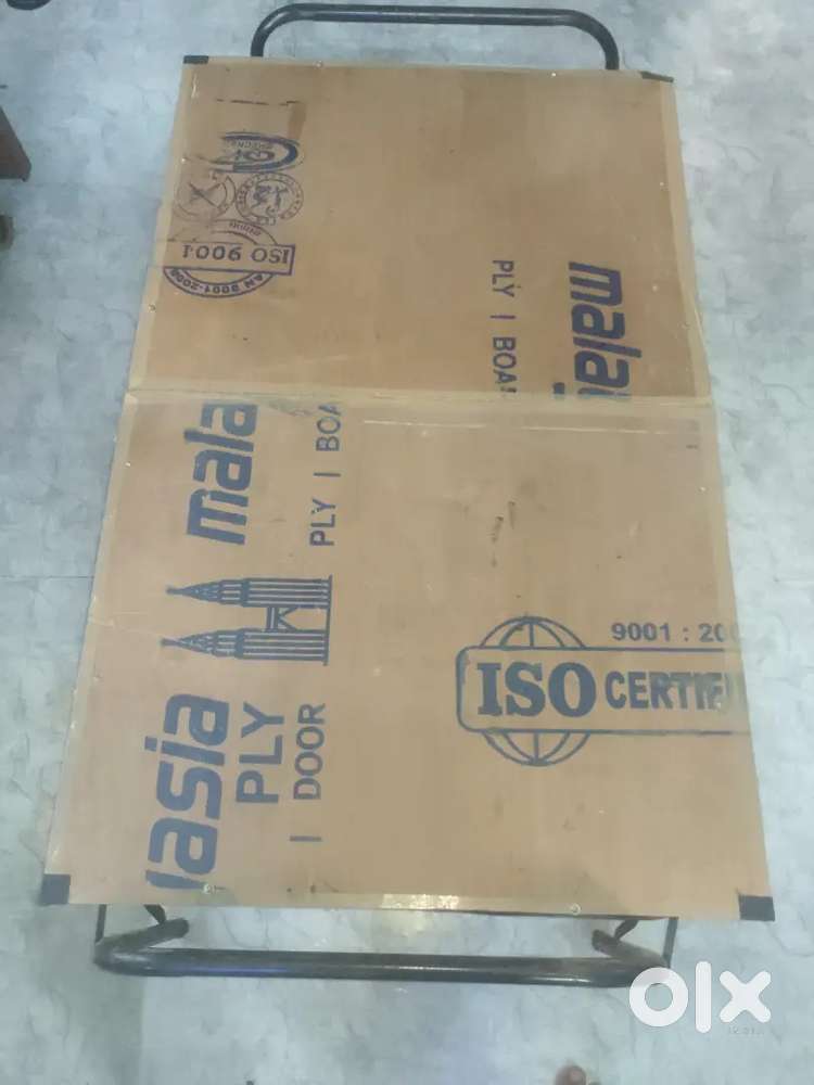 Folding wooden cum iron bed (cam khat)
