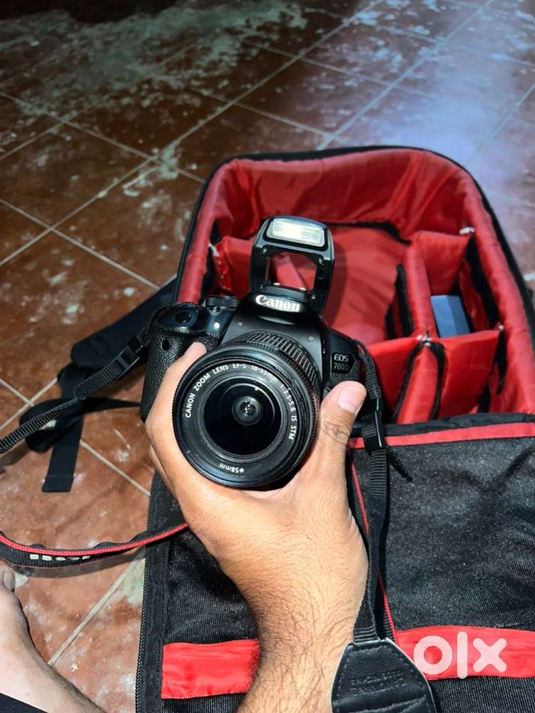 canon 700d with 18-55 lens and 3 battries with charger and bag