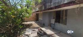 2BHK, one attached, old house. 2400 Sq Ft plot size. Old house. North east facing.