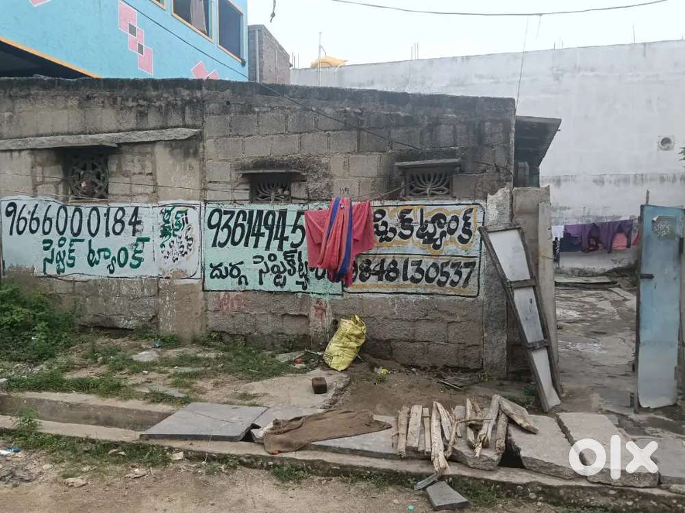 2portions of small sheet house & empty space also (