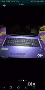 HP 565 TU model blue laptop
