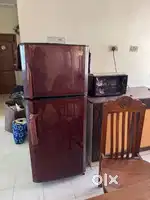 Godrej 240L double door fridge + free lg microwave oven