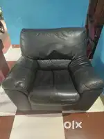 Black faux leather armchair