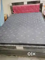 Double cot bed and partition glass