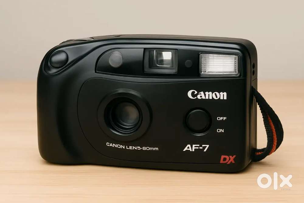 Canon camera, likely a point-and specifically a Canon F35.