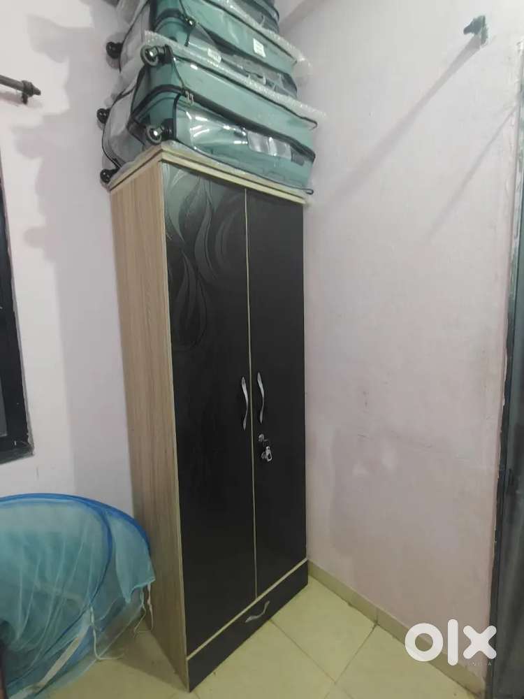 Selling work table,wardrobe,refrigerator,bed,2 chairs,air cooler.