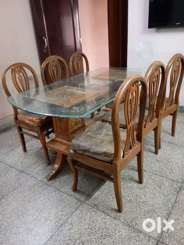 Glass table with 6 sagwan chairs