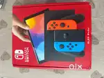 Unused Nintendo SWITCH  OLED with two games