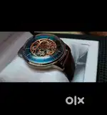 Titan automatic watch 12500 current market price one year