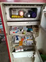 Whirlpool Red colour fridge in good condition only in 3000
