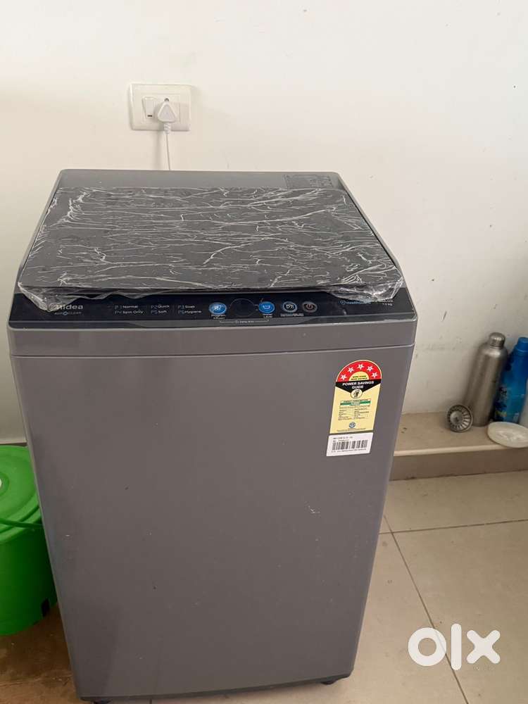 A Midea 7.5 kg fully automatic top load model (MWMTL075ZOF)
