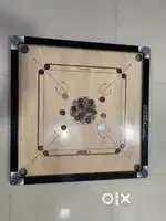 Carrom board available sale (excellent condition) used only for 5 time