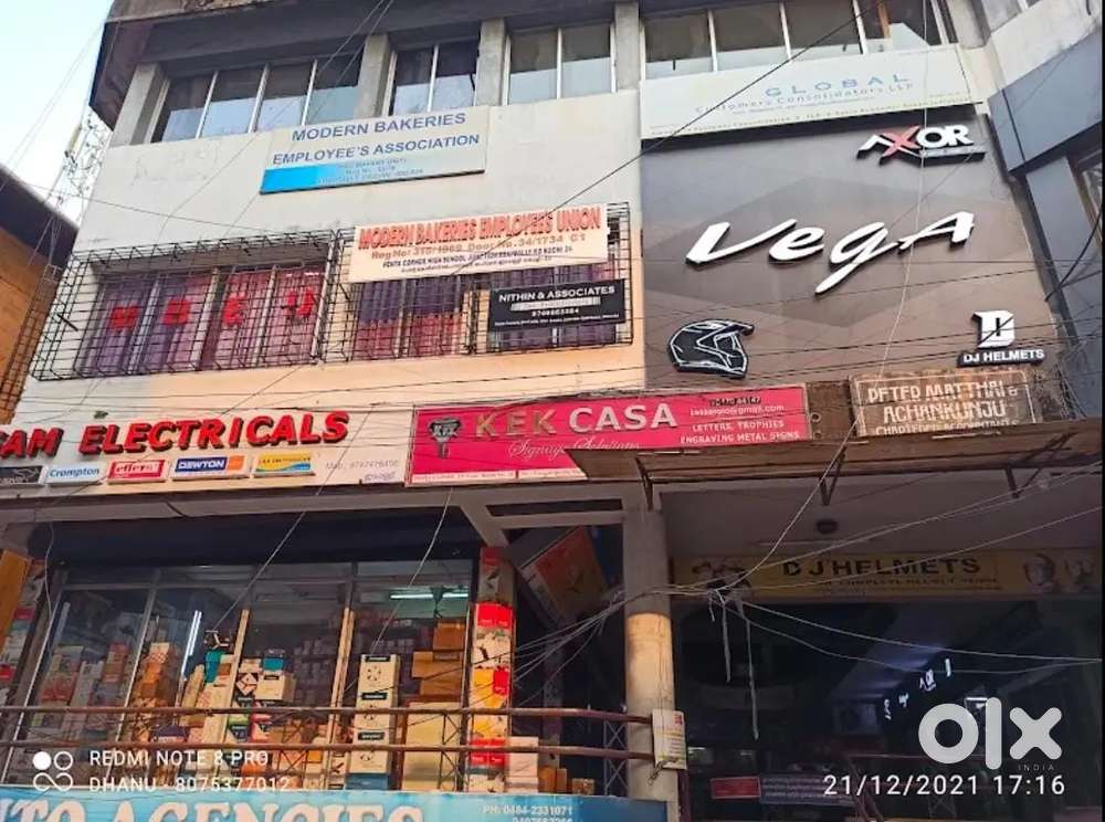 Sales man at helmet and riding gear store