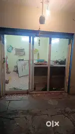 Shop purpose sliding glass door and tailor cutting table