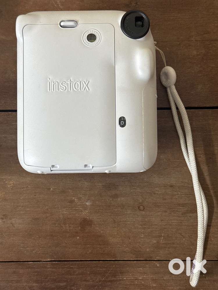 Instax 12 white polaroid camera