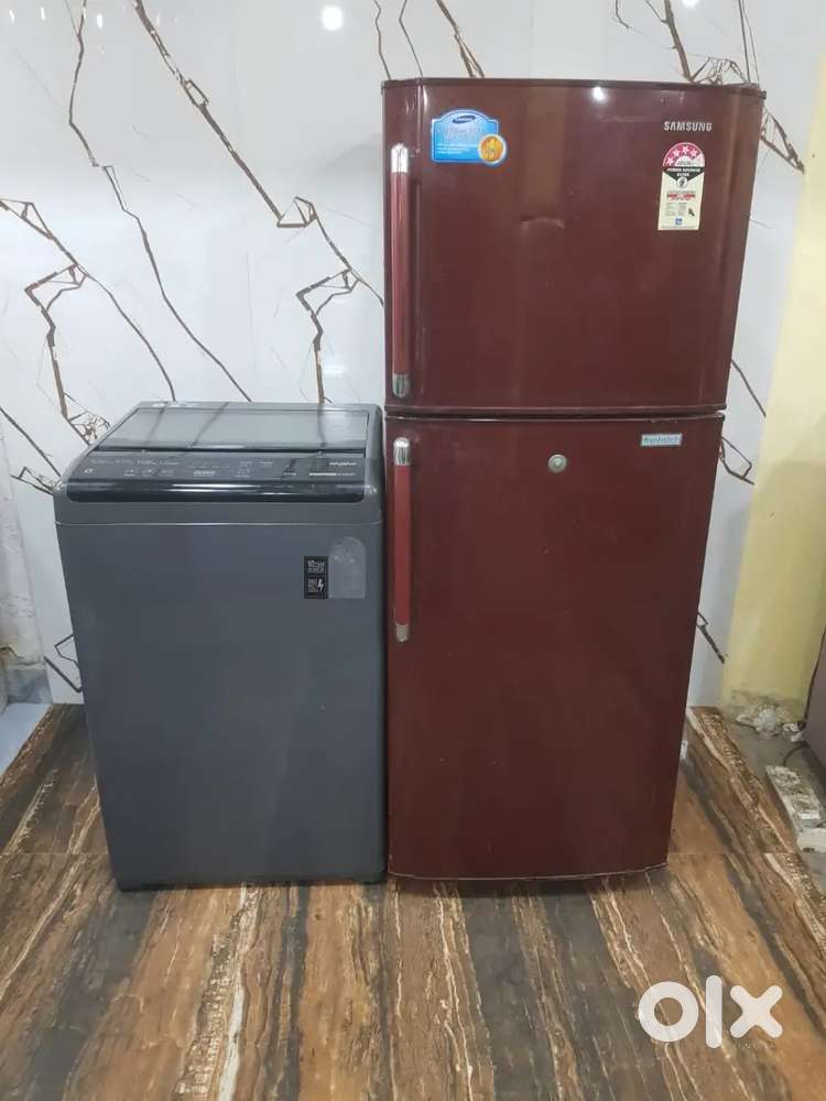 Samsung double door refrigerator nd Whirlpool top load washing machine