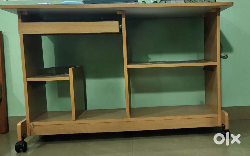 Computer table with keyboard drawer and sliding mouse pad and wheels