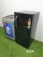 Lg black refrigerator & lg 6.2 kg machine in workng condition