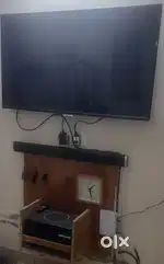 50 led smart tv, bar speaker and woofer for sale