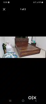 New 6x5 storage bed with headside cushions