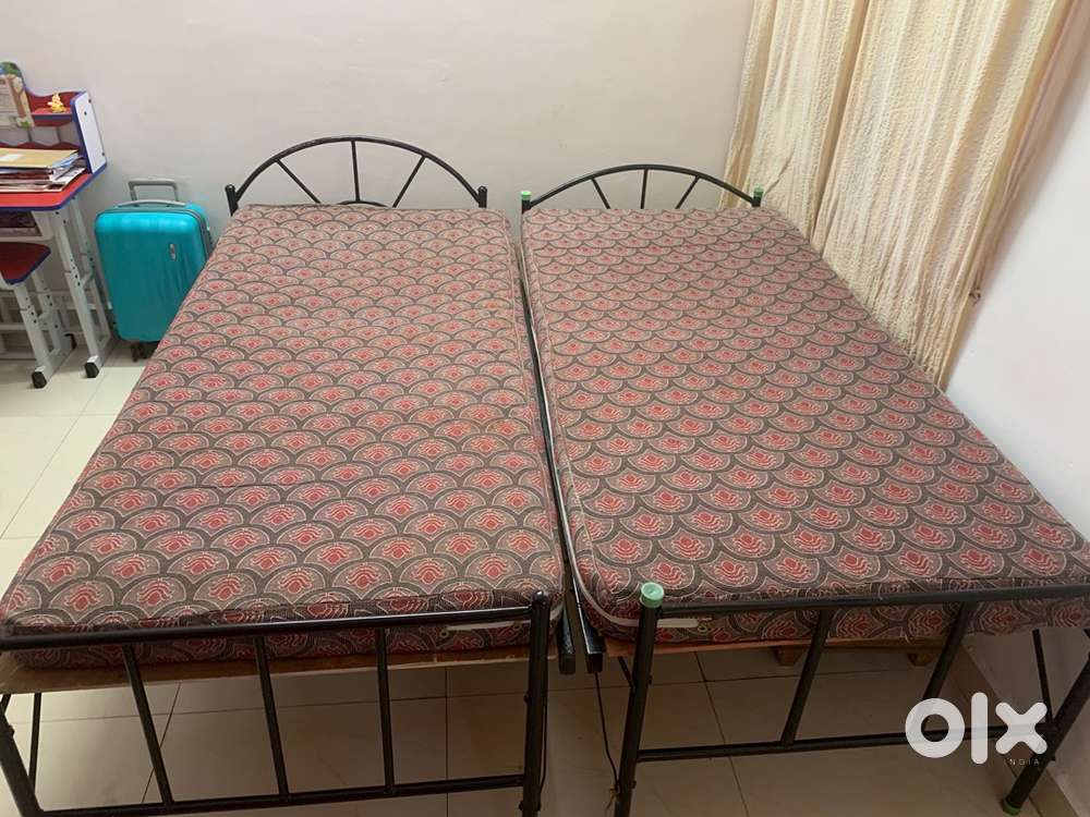 iron cot bed double with curl on mattress