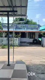 4cent plot with house 60meter away from nh66 cheranelloor