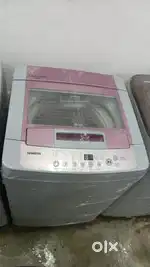 LG washing machine fully automatic top load with warranty and good con