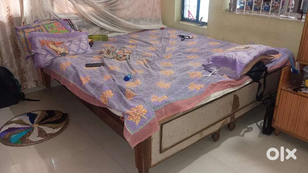Double bed in moderate condition