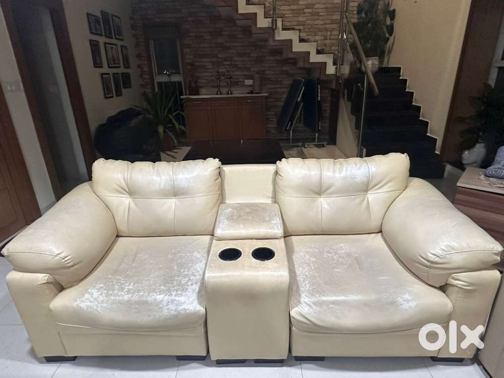 2-seater beige sofa with cup holder