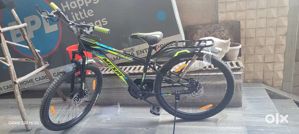 One month old Cycle black and green color