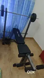 Multipurpose gym bench and 30 kg rubber weights