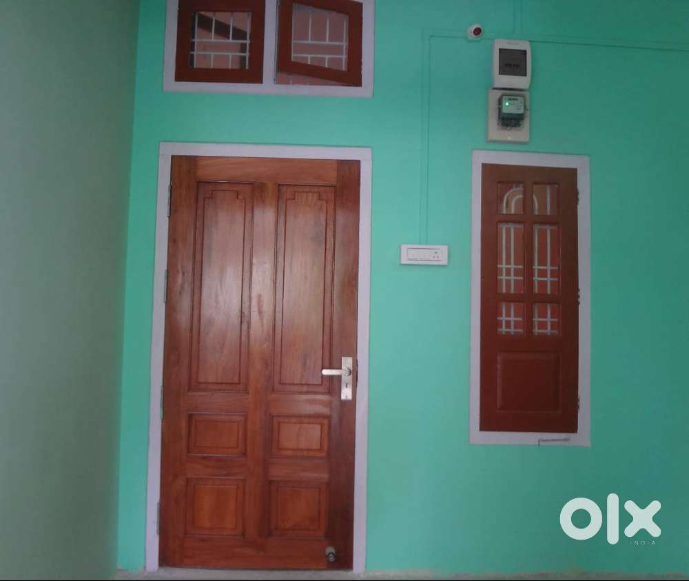 Two rooms with attached bathroom and a separate kitchen.